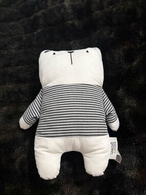 Bizzi Growin bear plush featuring a cute black-and-white striped shirt pattern